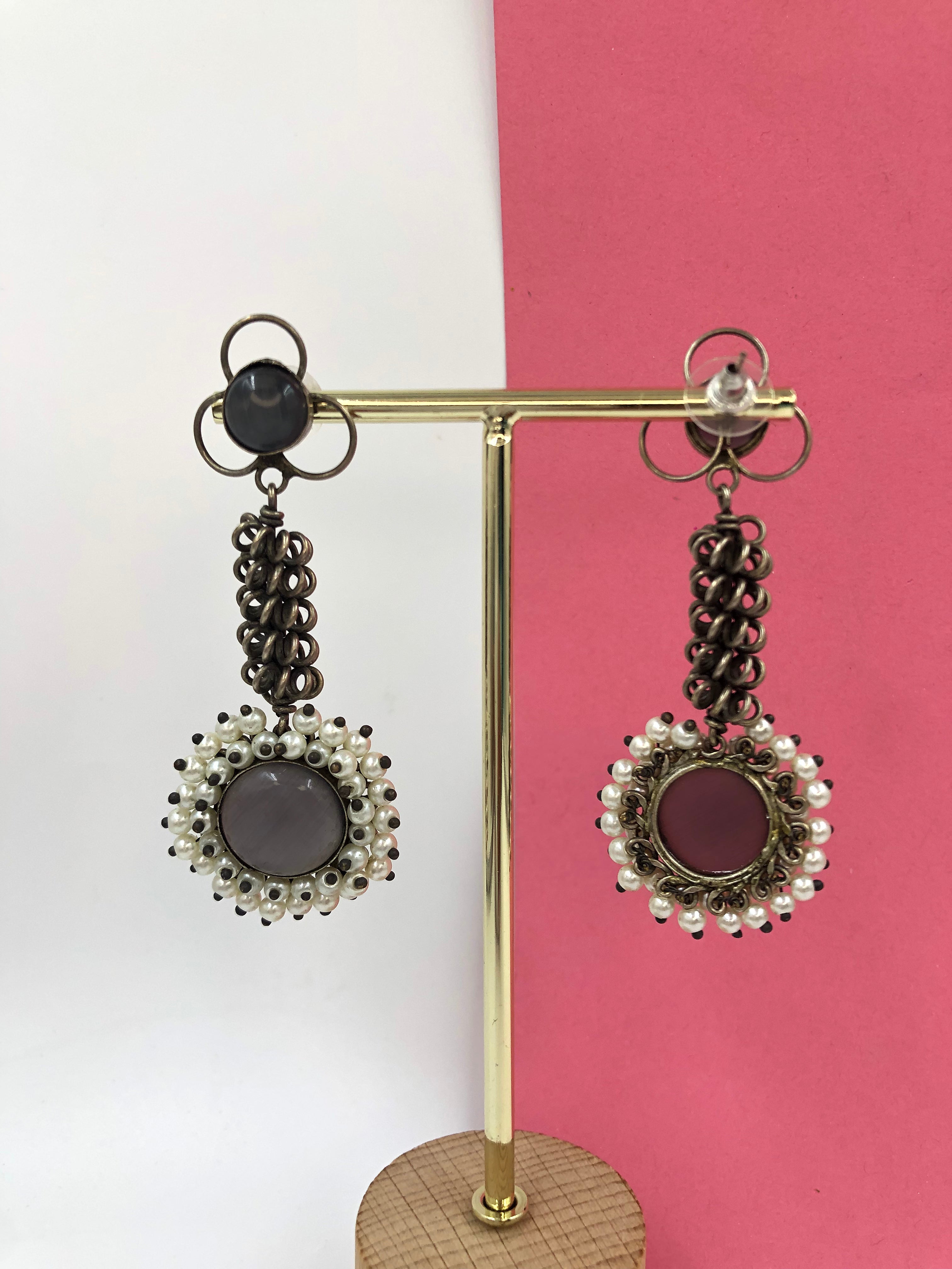 Silvered Elegance: Grey Danglers with Interwoven Metal and Pearls