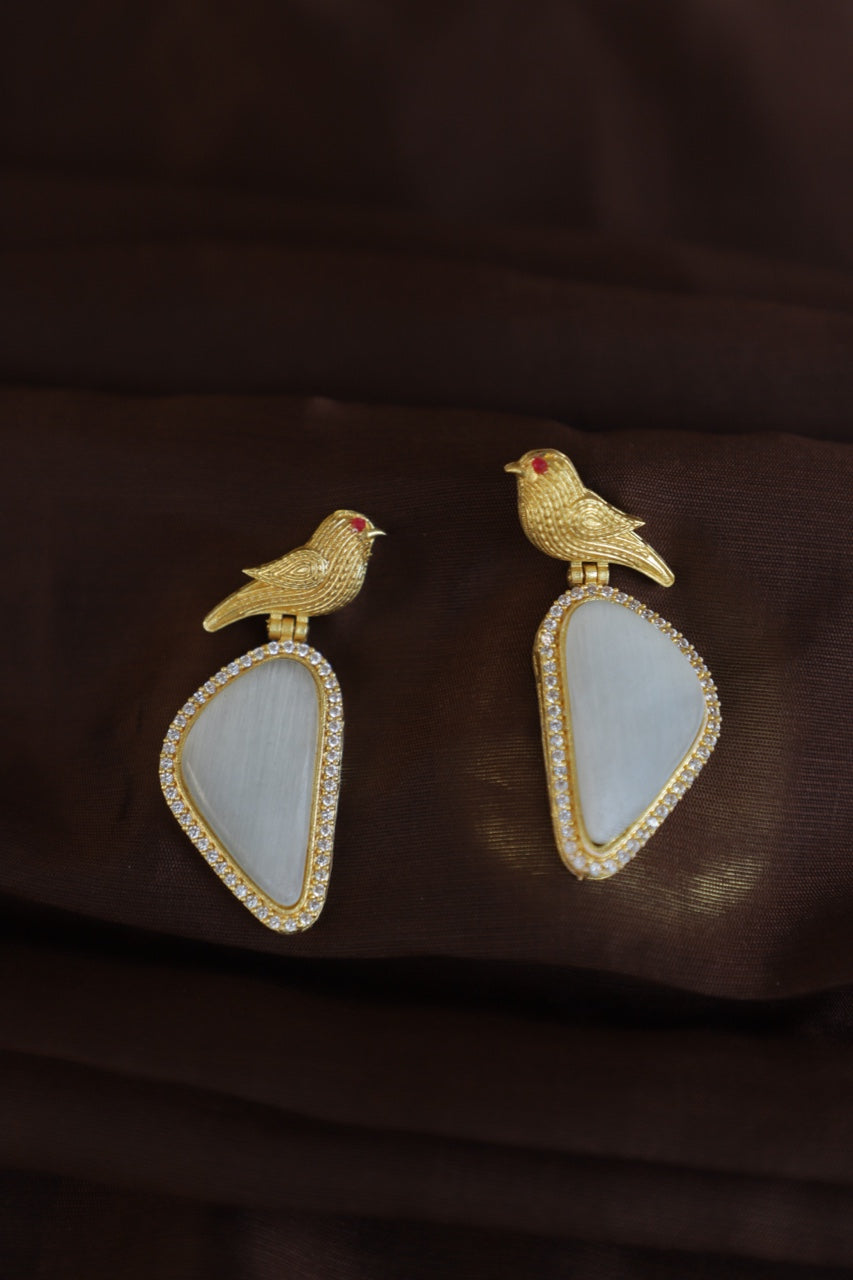 Golden Winged Perfection: Grey Stone Crystal Earrings