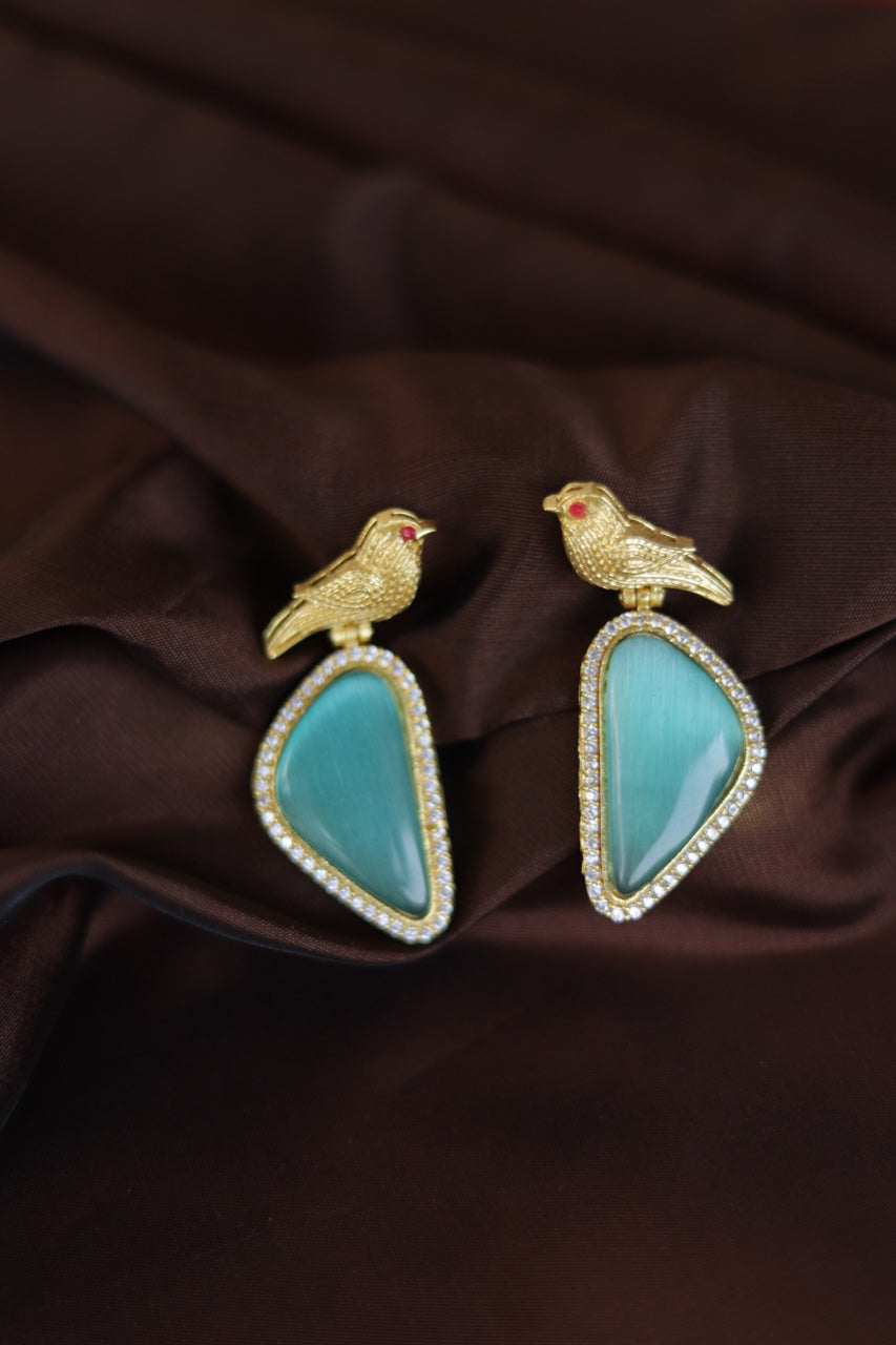 Golden Winged Perfection: Blue Stone Crystal Earrings