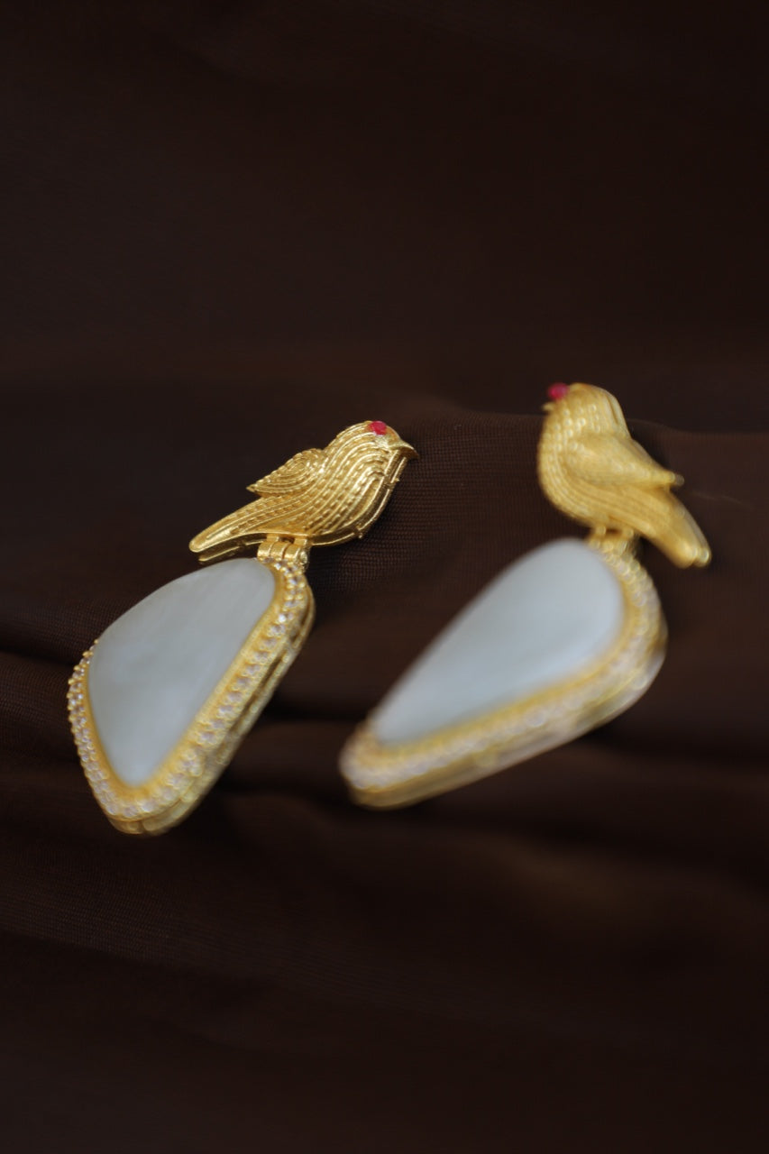 Golden Winged Perfection: Grey Stone Crystal Earrings