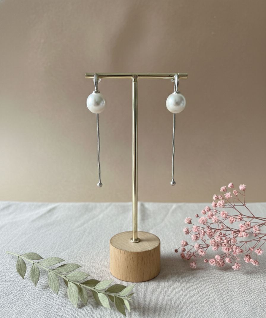 The Pearl Pendulum Drops