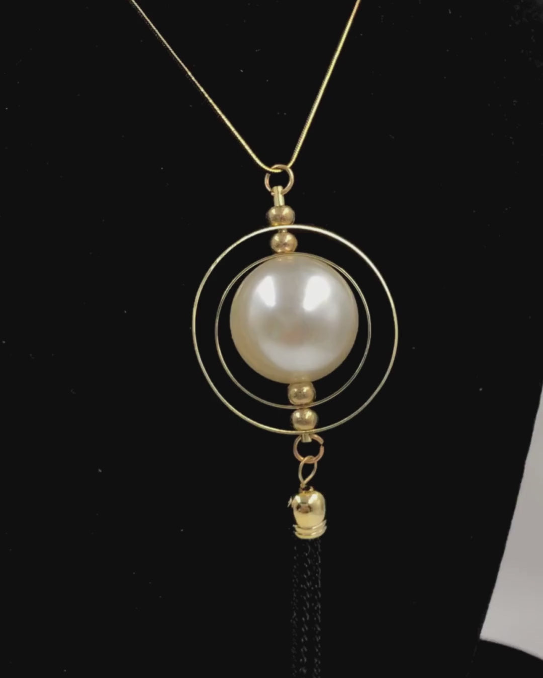 Timeless Circles: Concentric Design with Pearl Bead and Tassel